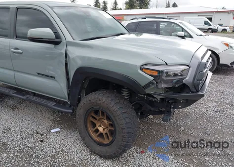 2023 Toyota Tacoma Trail Edition z USA, uszkodzony, nr VIN 3TYCZ5AN5PT132399